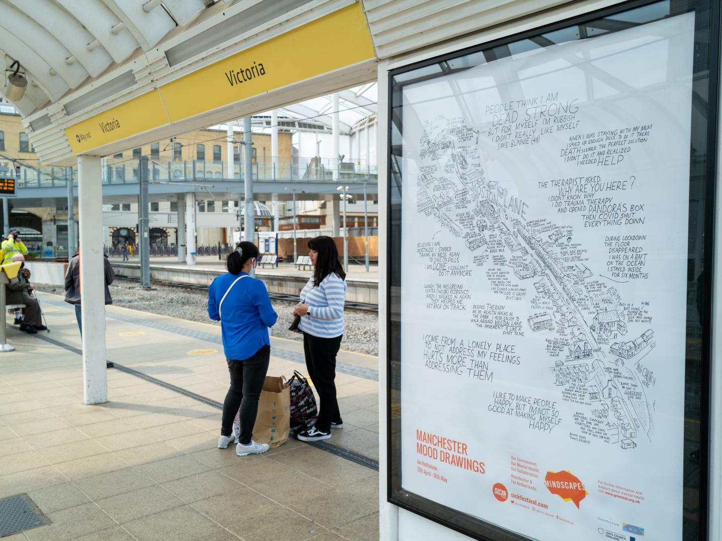 poster, bus stop, people