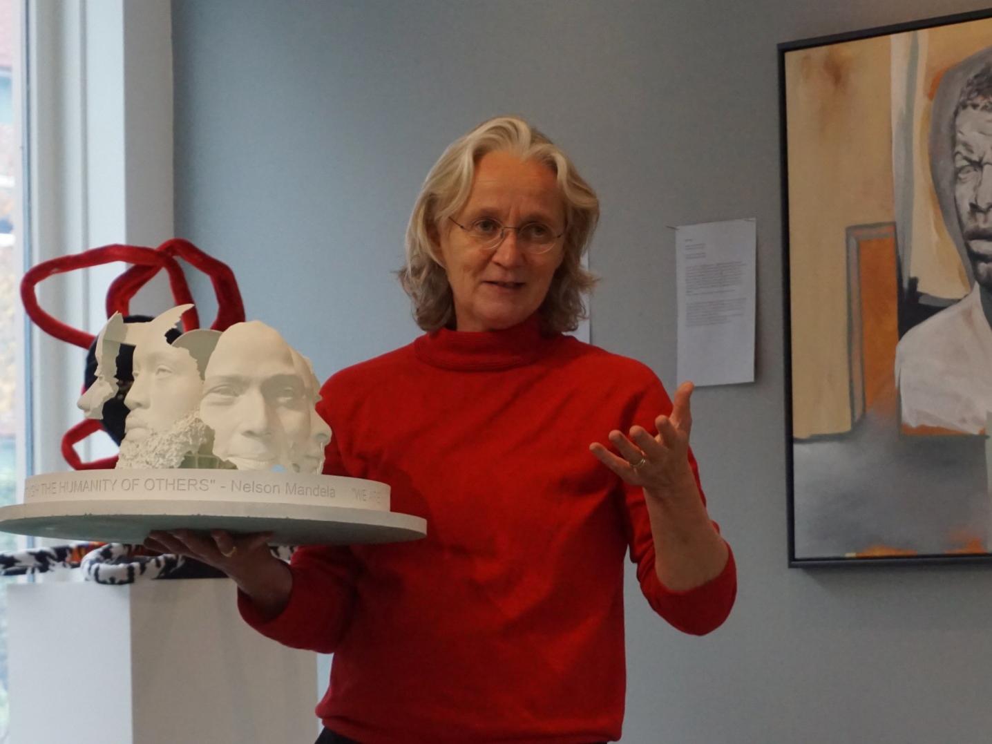 Annet Zondervan, director at CBK Zuidoost, with a model of the Mandela monument 'Rona Batho'.