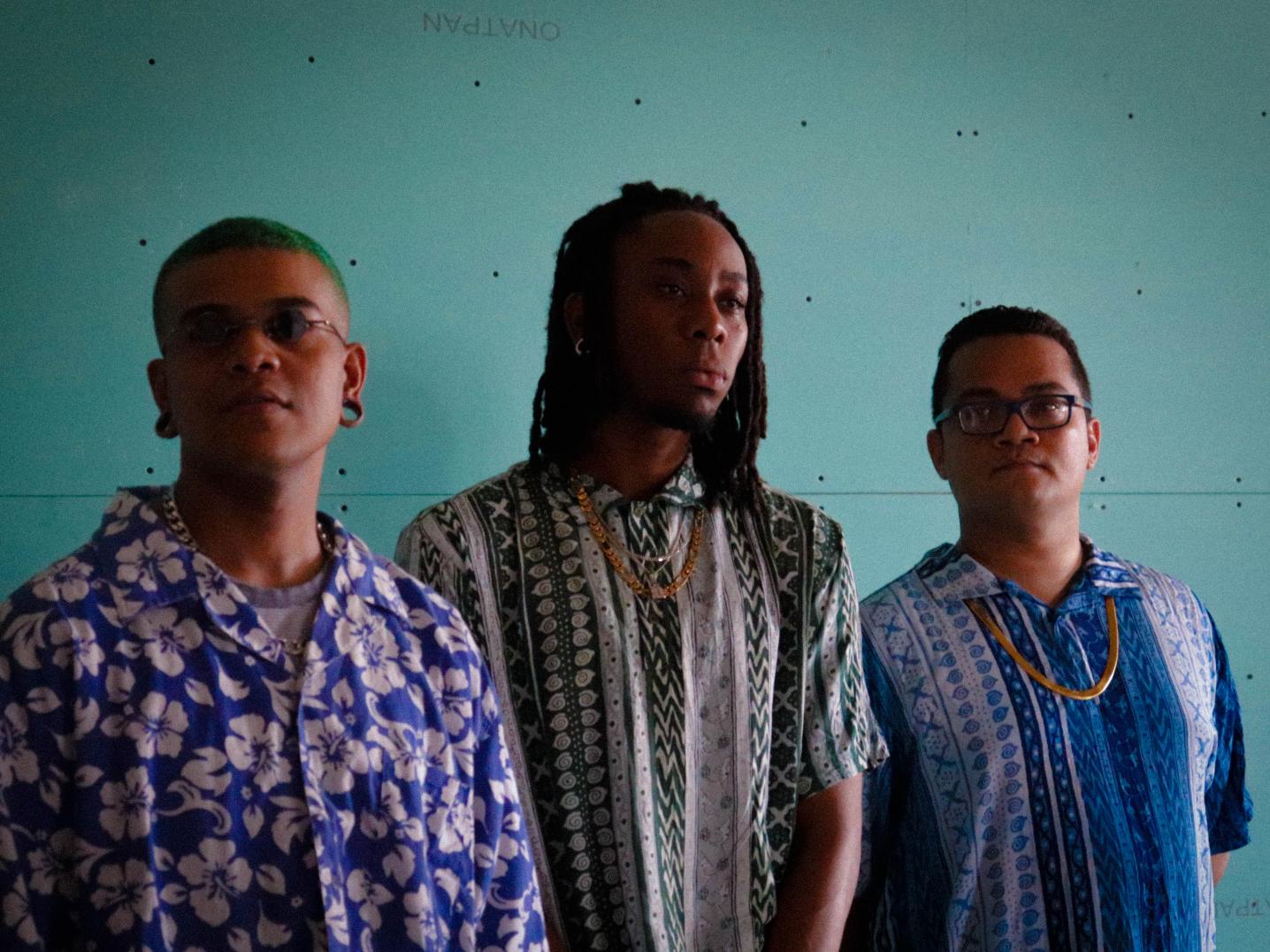 The band members of Luguber, from left to right:  Shavero Ferrier, Akeem Smith en Regillio Padma.