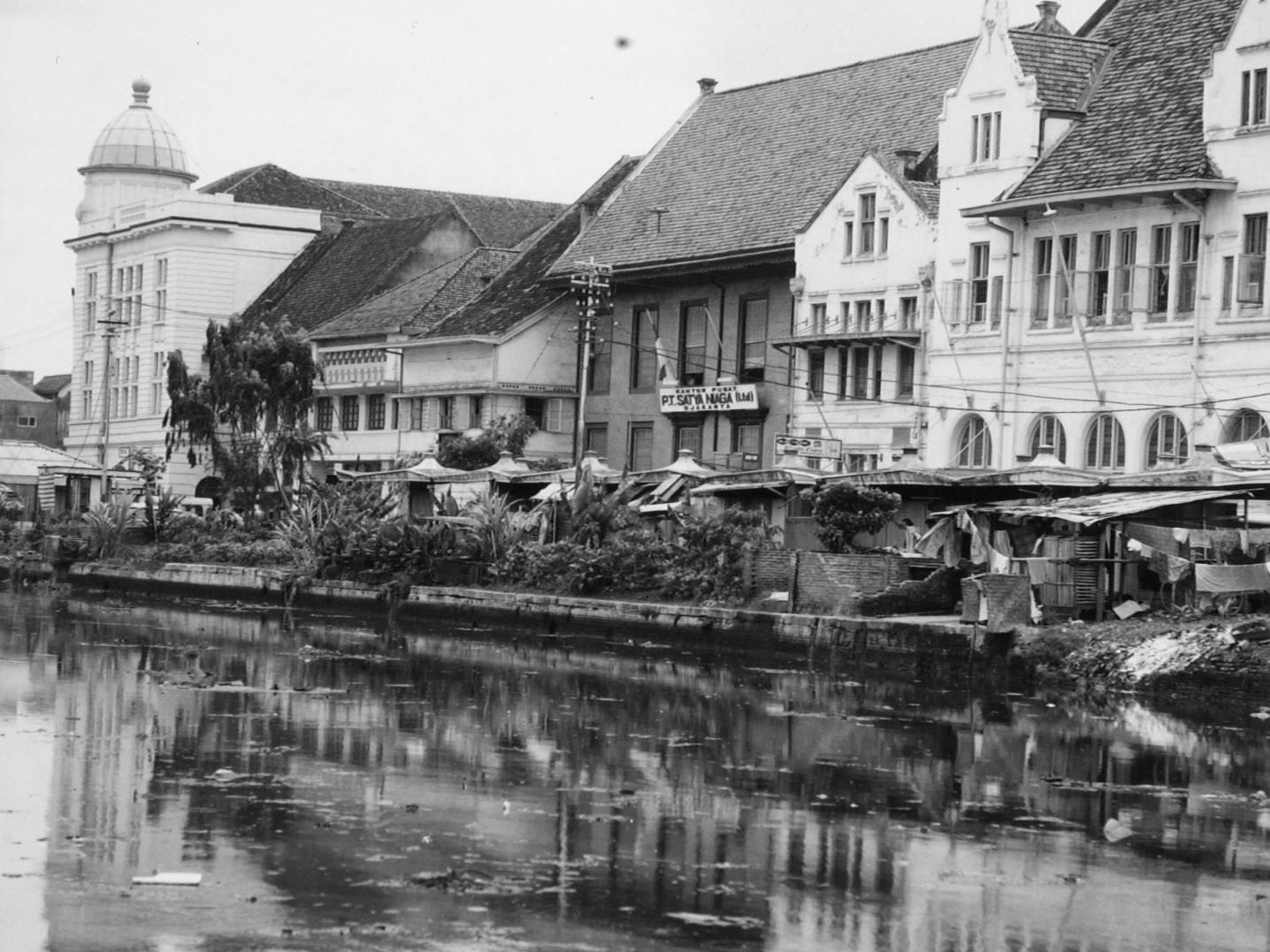 a view on derelict colonial buildings along the Kali Besar in Kota Tua, Jakarta in 1971