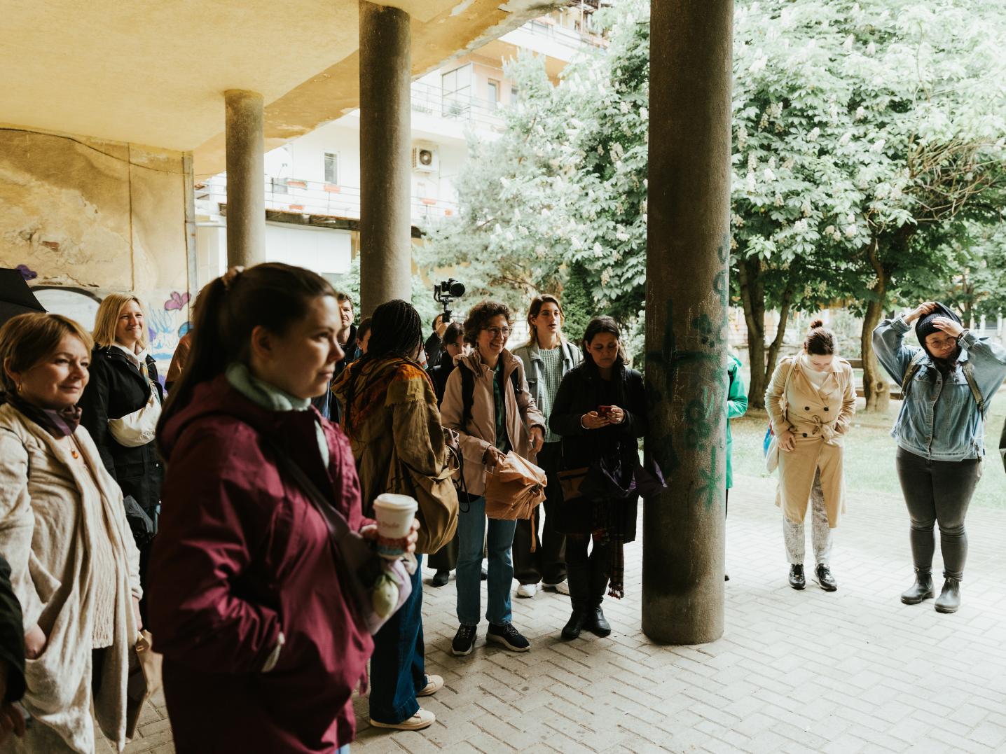 A group of people having a site visit at a cultural center