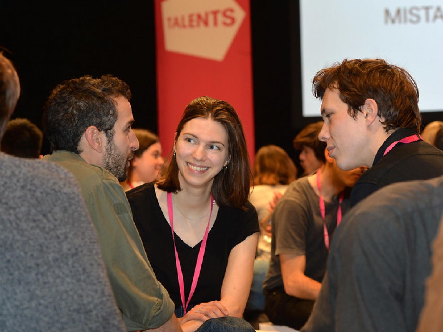 Berlinale Talents attendees shake hands at the globale speed matching event at Berlinale.