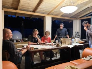 group of people creating at a table
