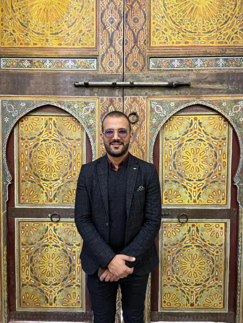 portrait of Alae Fechtali, Chief Curator at the Museum of Islamic Art Al Batha in Fez.