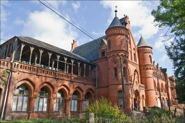 An old red sandstone building in Poland