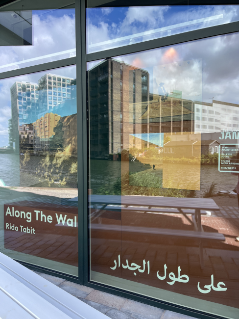 Window of Galerie Poche, exhibiting the works of Rida Tabit