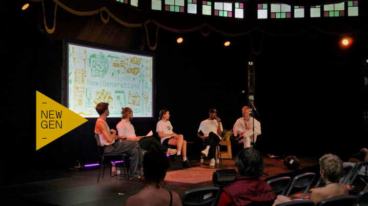 Five people having a panel discussion during the NewGen meeting at the Noorderzon Festival, pictured together with some of the audience.