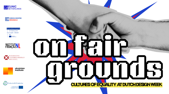 Text: On Fair Grounds, in front of two shaking hands