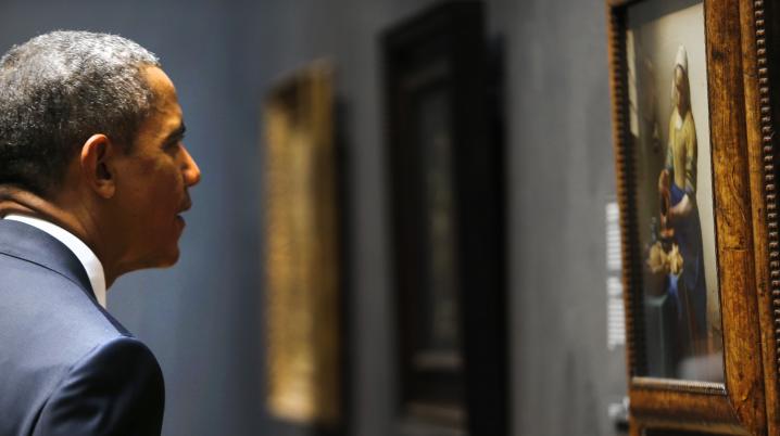 President Barack Obama looking at ‘Het Melkmeisje’ by Johannes Vermeer at the Rijksmuseum, Amsterdam, 2014. Photo Dave de Vaal via Wikimedia Commons